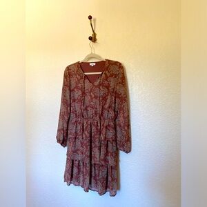 Long sleeved dress with paisley print and ruffles